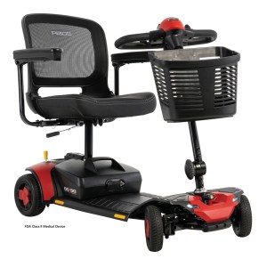 Pride Go Go Elite Traveller 3 4-Wheel mobility scooter in red, front angle view with basket