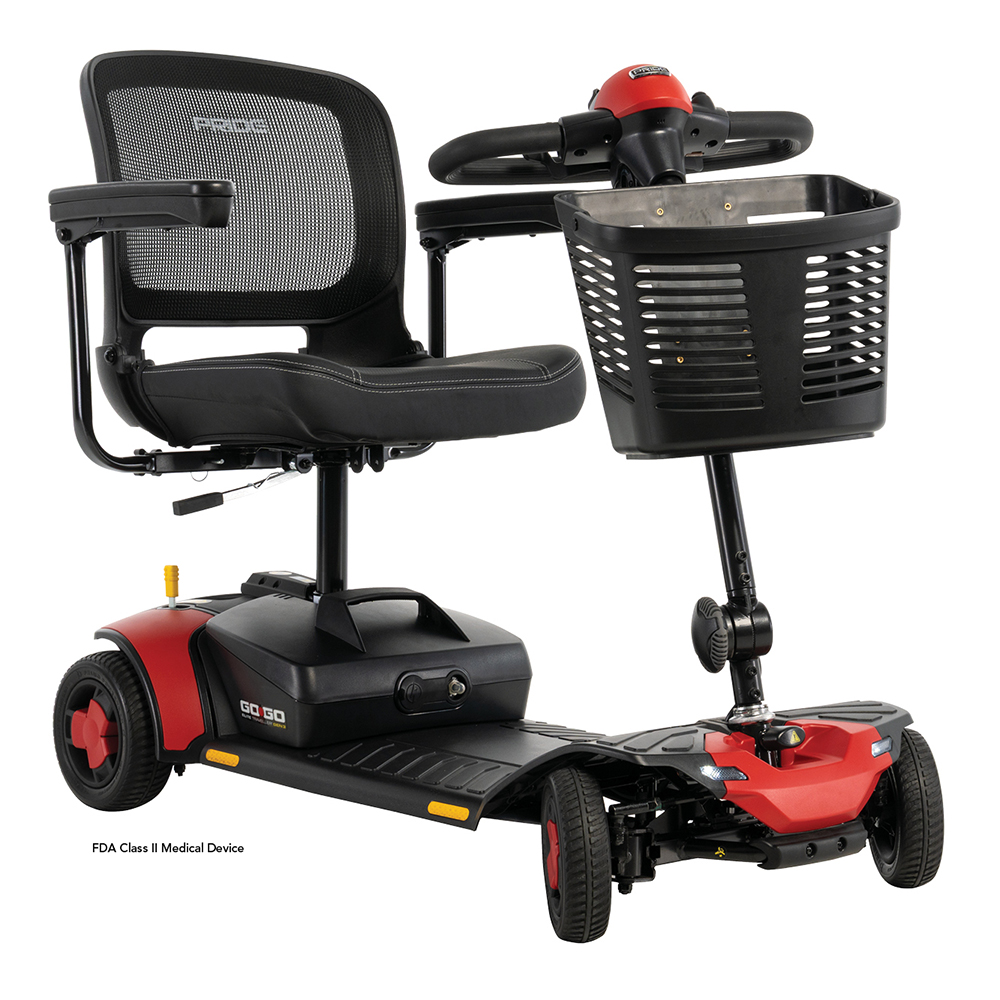 Pride Go Go Elite Traveller 3 4-Wheel mobility scooter in red, front angle view with basket