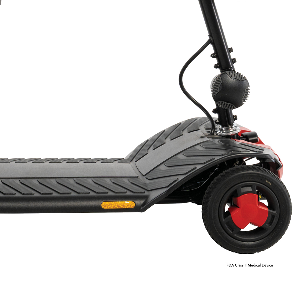 Close-up of the footboard and front wheel on the Pride Go Go Elite Traveller 3 4-Wheel scooter