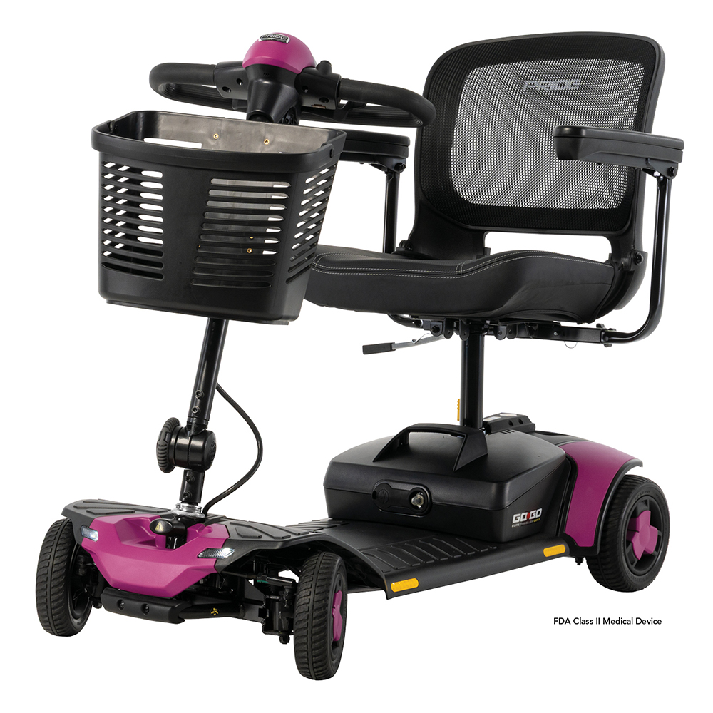 Pride Go Go Elite Traveller 3 4-Wheel mobility scooter in Sugarplum pink, front angle view with basket