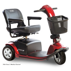 Pride Victory 10 3-Wheel mobility scooter in Candy Apple Red, front angle view with front basket, LED headlight and padded seat