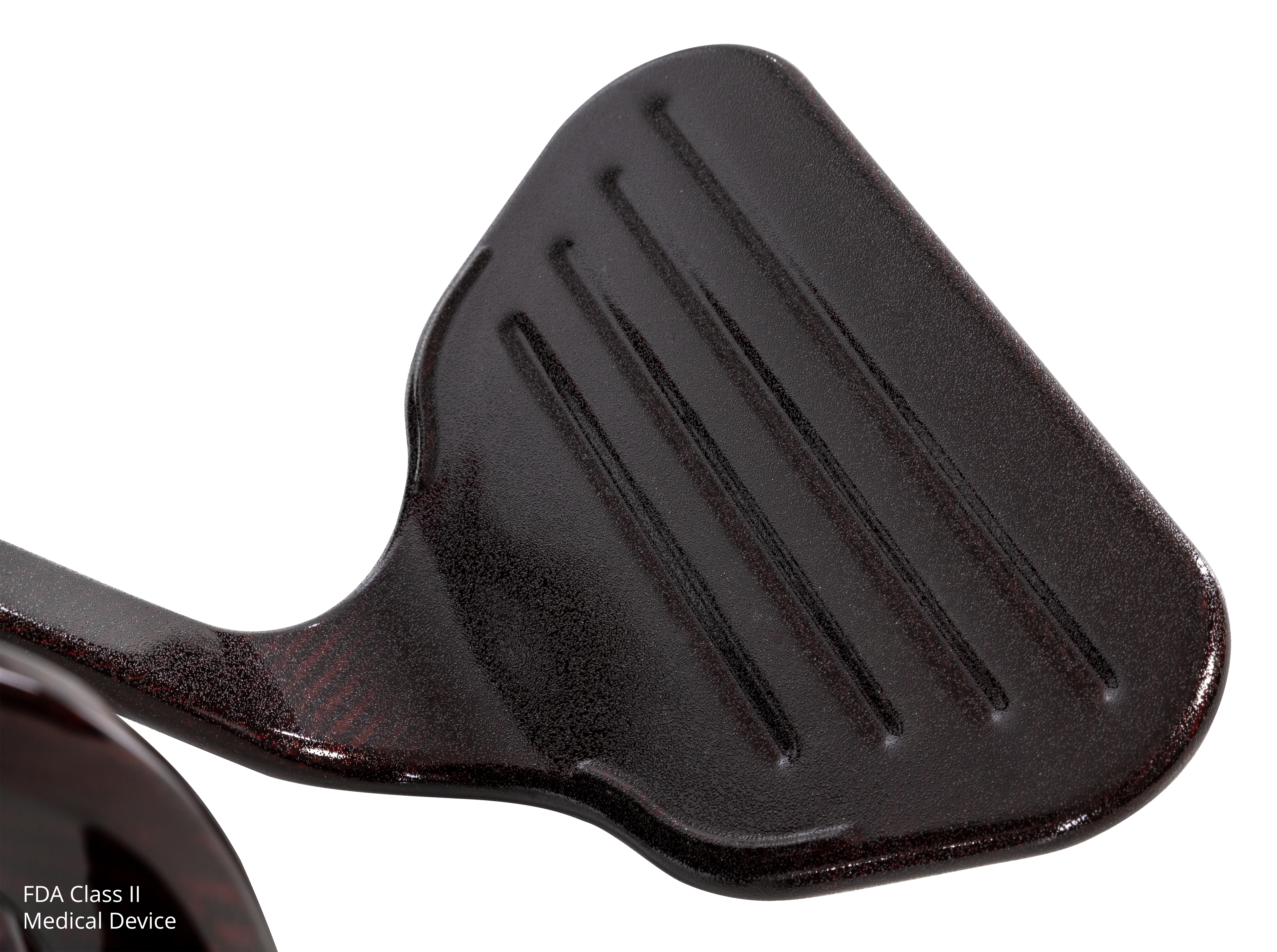 Close-up of the footplate on the Pride Jazzy Carbon 27 power wheelchair in Black Cherry