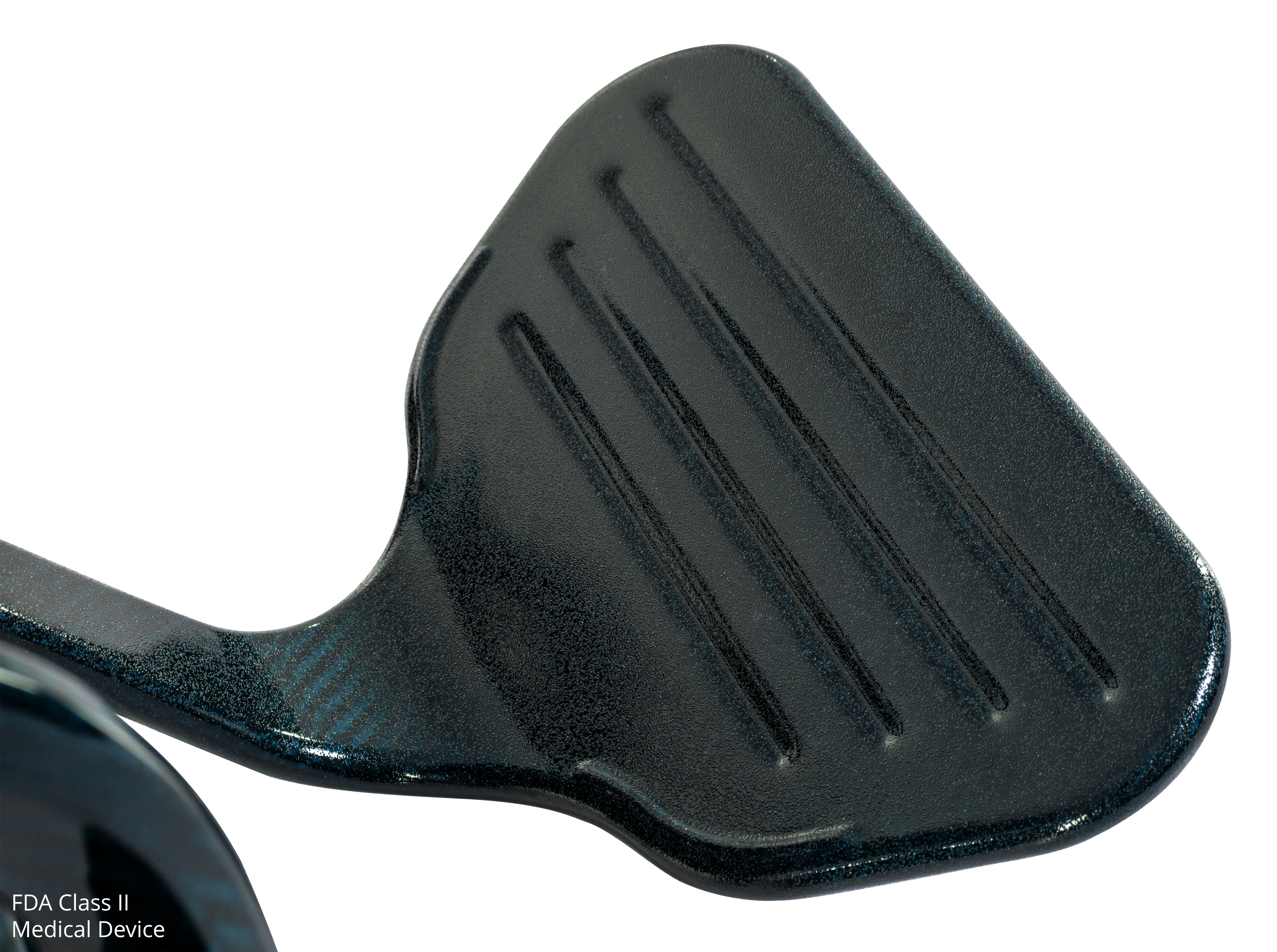 Close-up of the footplate on the Pride Jazzy Carbon 27 power wheelchair in Night Sky