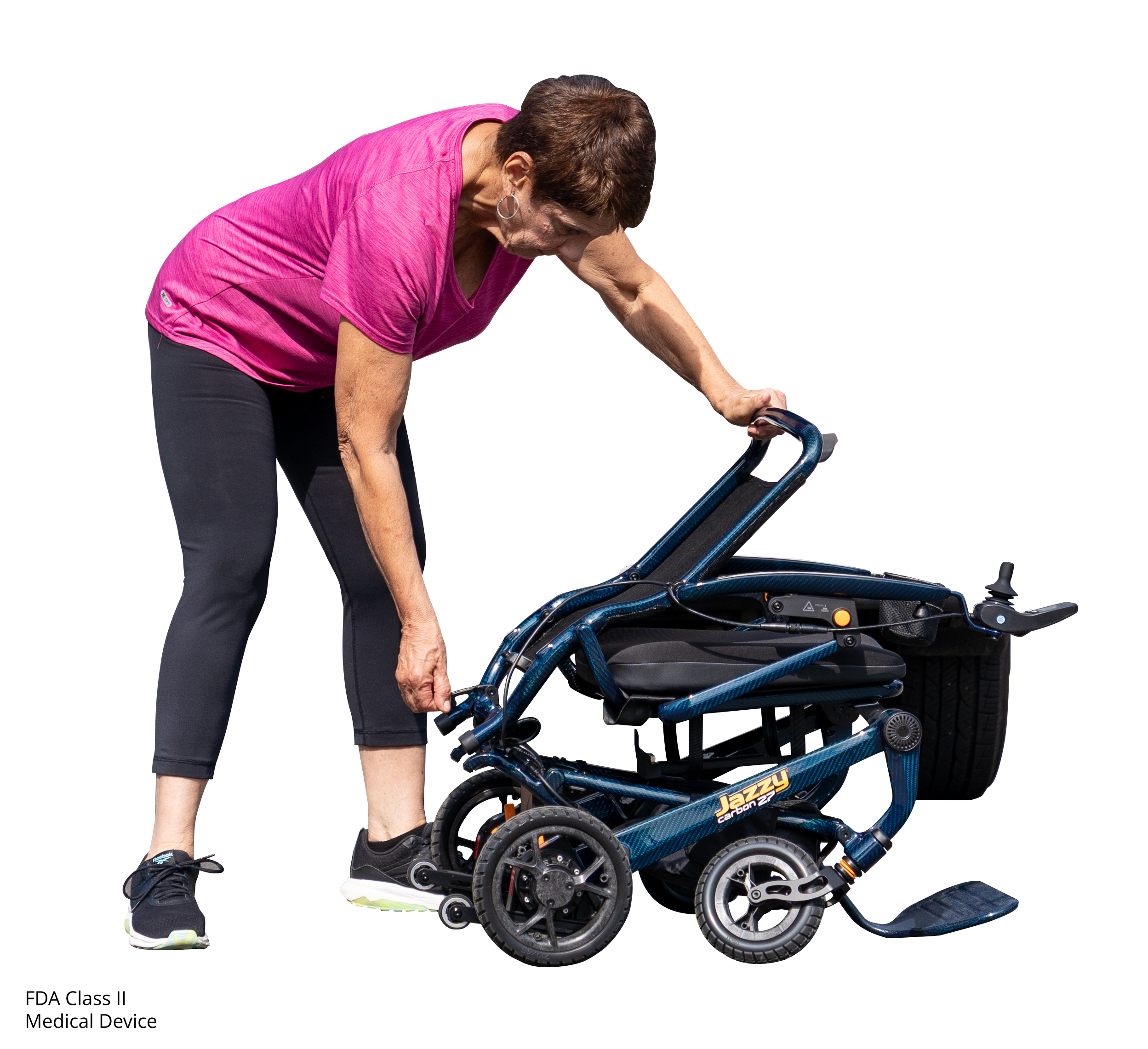 Pride Jazzy Carbon 27 power wheelchair unfolding sequence, step 4 of 5: frame nearly fully open